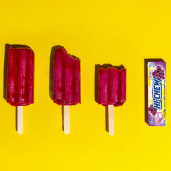 Hi-CHEW Grape Stick next to grape popsicles