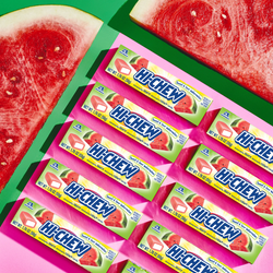 Hi-CHEW Watermelon Sticks next to watermelon slices